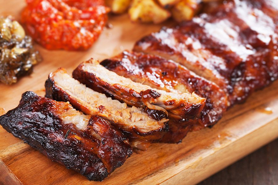 Roasted pork ribs marinated in barbecue sauce and glazed with ho